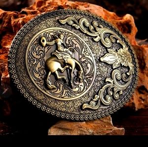 New gold western style rodeo cowboy on horse belt buckle approximately 3.75 inch